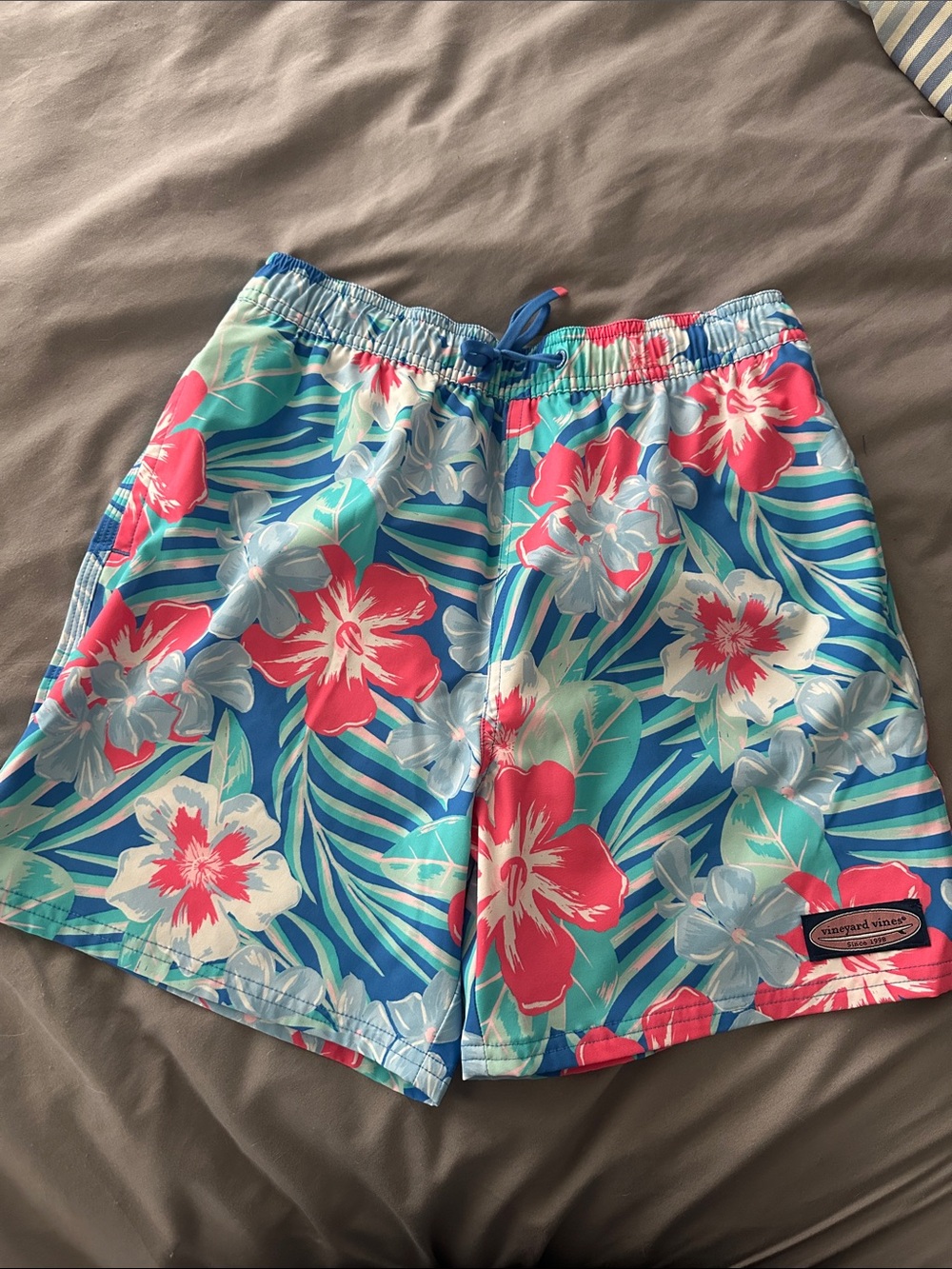 Vineyard Vines Men’s Blue Tropical Floral Swim Shorts with Coral Accents